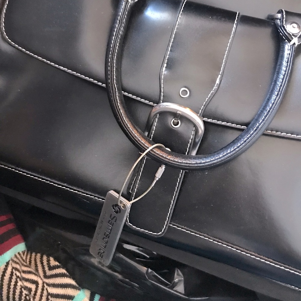 Franklin Covey Black Leather Wheeled Carry On Travel Bag Briefcase